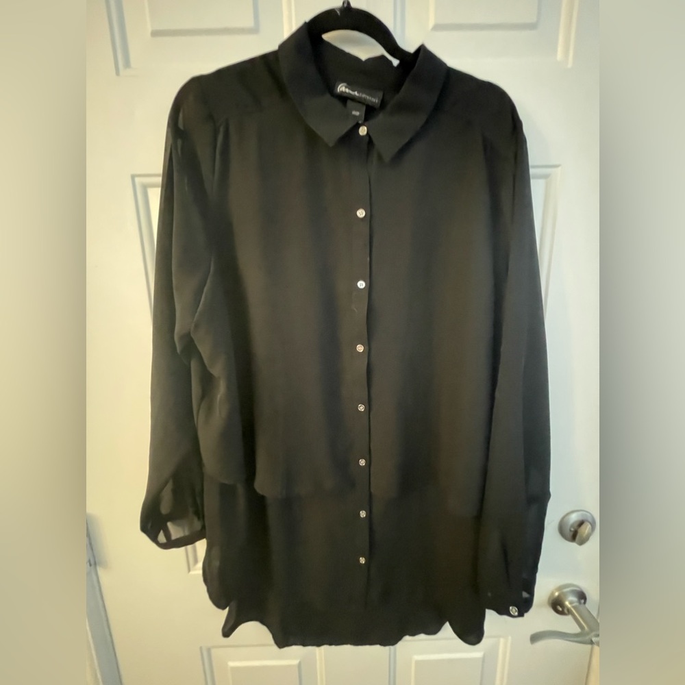 Button down Blouse long sleeve or 3/4 length. Dressy or casual